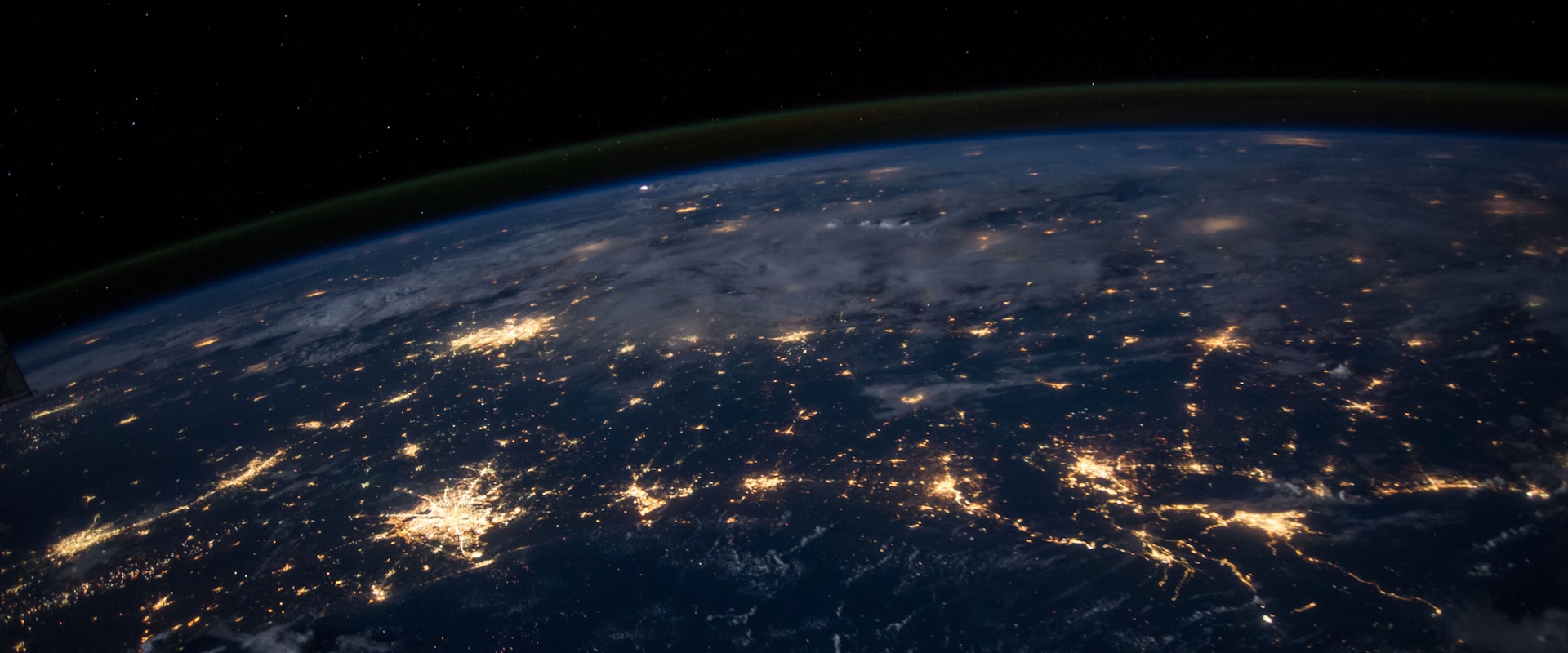 Earth at night, representing global minimum tax coordination across jurisdictions